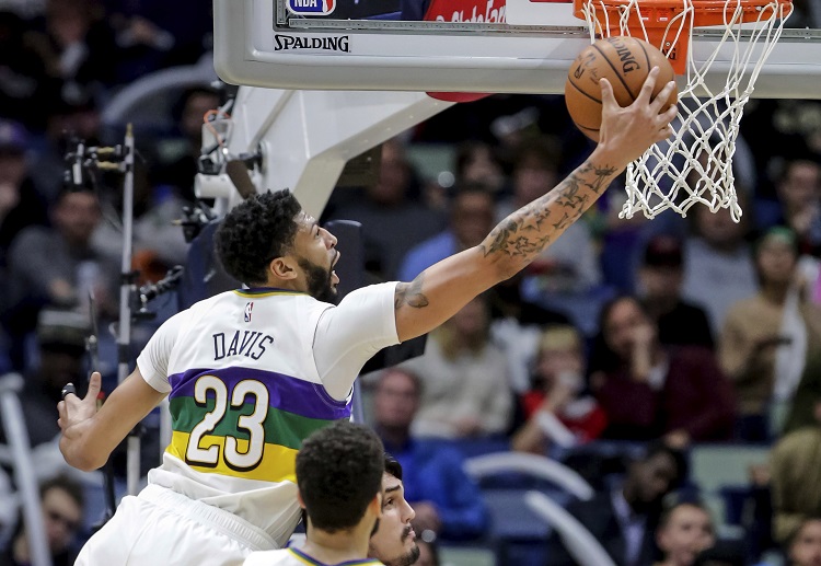 Pelicans forward Anthony Davis grabs a rebound during the NBA match against the Timberwolves