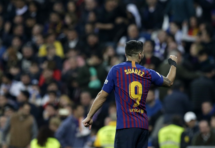 Barcelona striker Luis Suarez double downs take victory in Copa del Rey clash against Real Madrid in Santiago Bernabeu